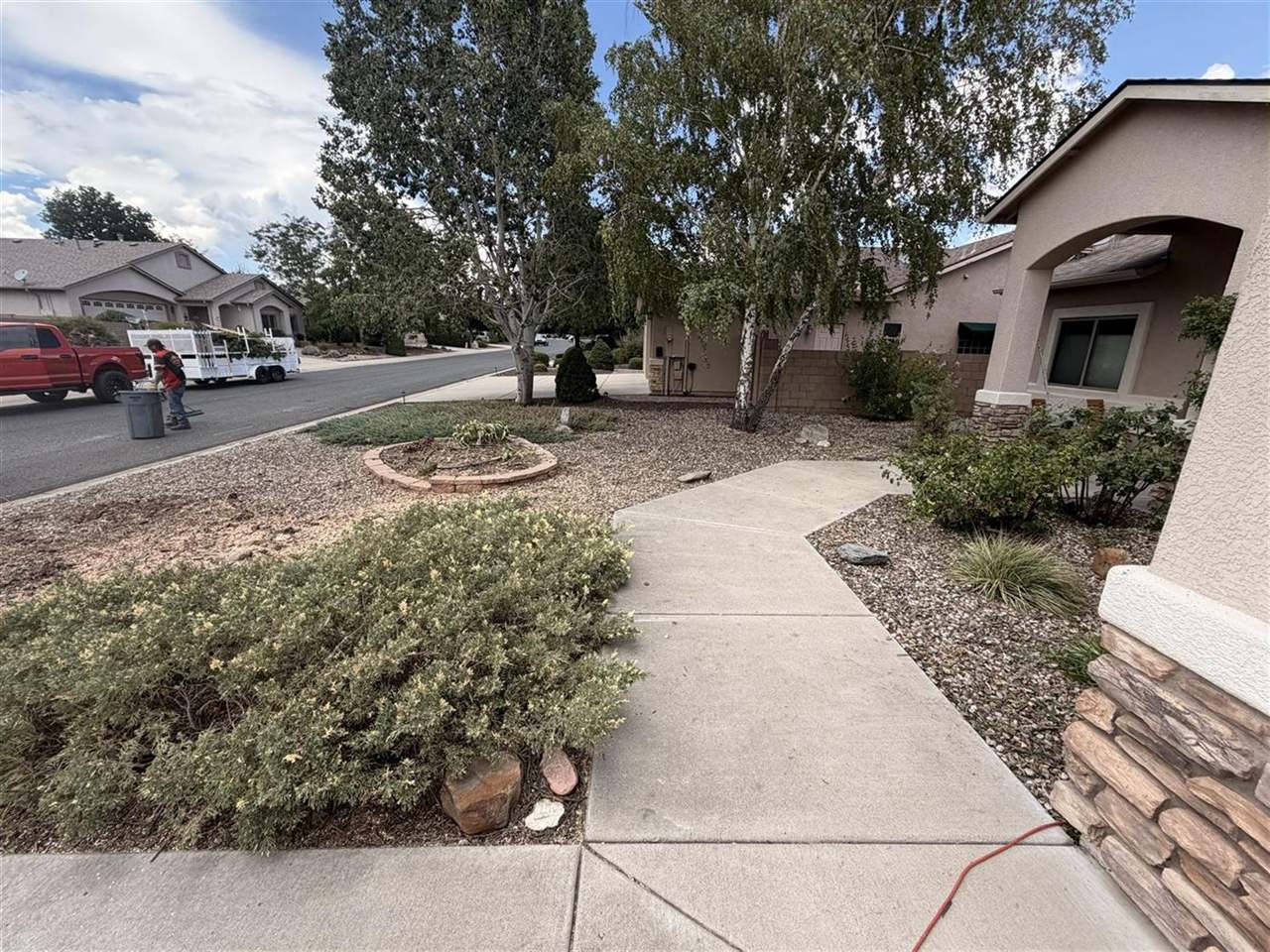 Front yard cleared and swept after emergency tree removal in Prescott Valley